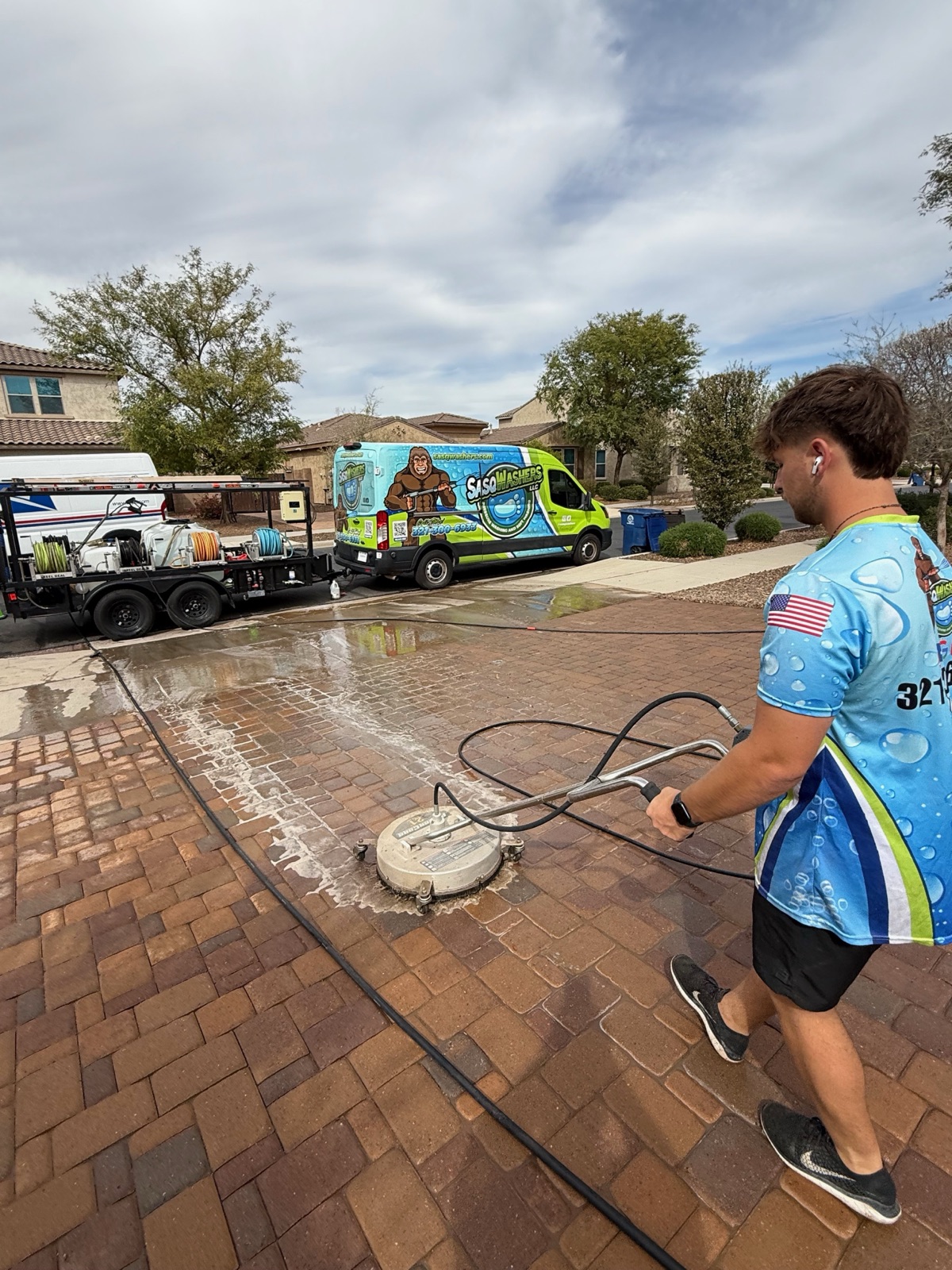 Driveway before and after pressure washing in Gilbert, AZ
